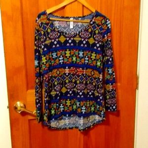 A long sleeve multi colored shirt By Lu La Roe.